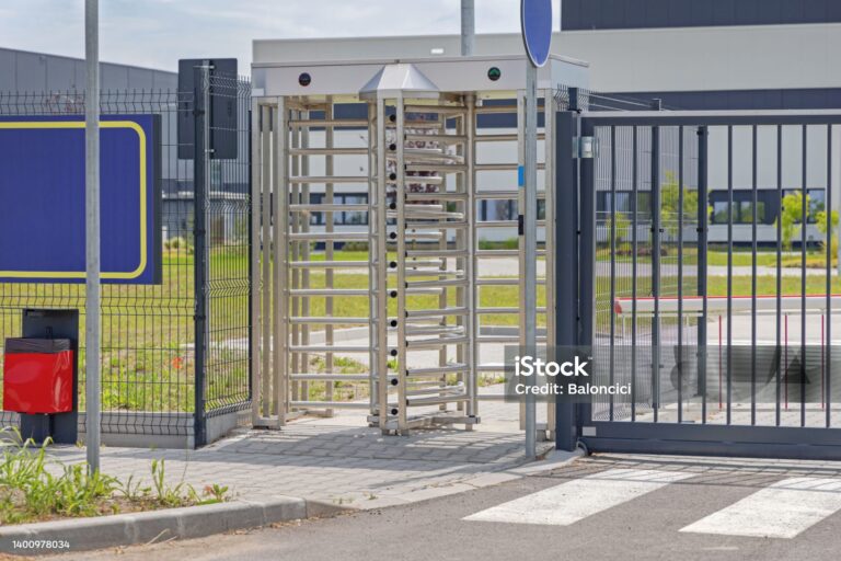 Employee Entrance Turnstile Doors at Factory Gate Fence